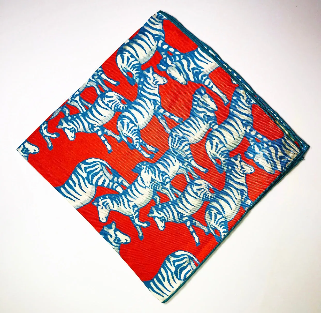 ENGLISH WOVEN POCKET SQUARE - ORANGE WITH BLUE ZEBRA PRINT