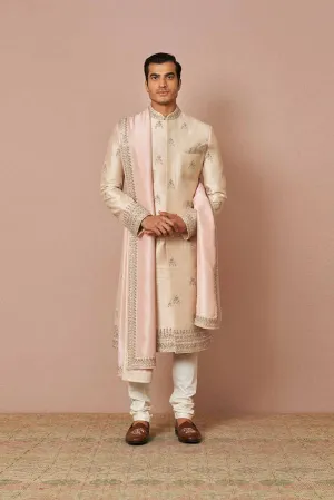 IVORY RAWSILK BUTTI EMBROIDERED SHERWANI SET WITH SILK BABY PINK DUPATTA